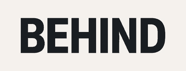 Behind